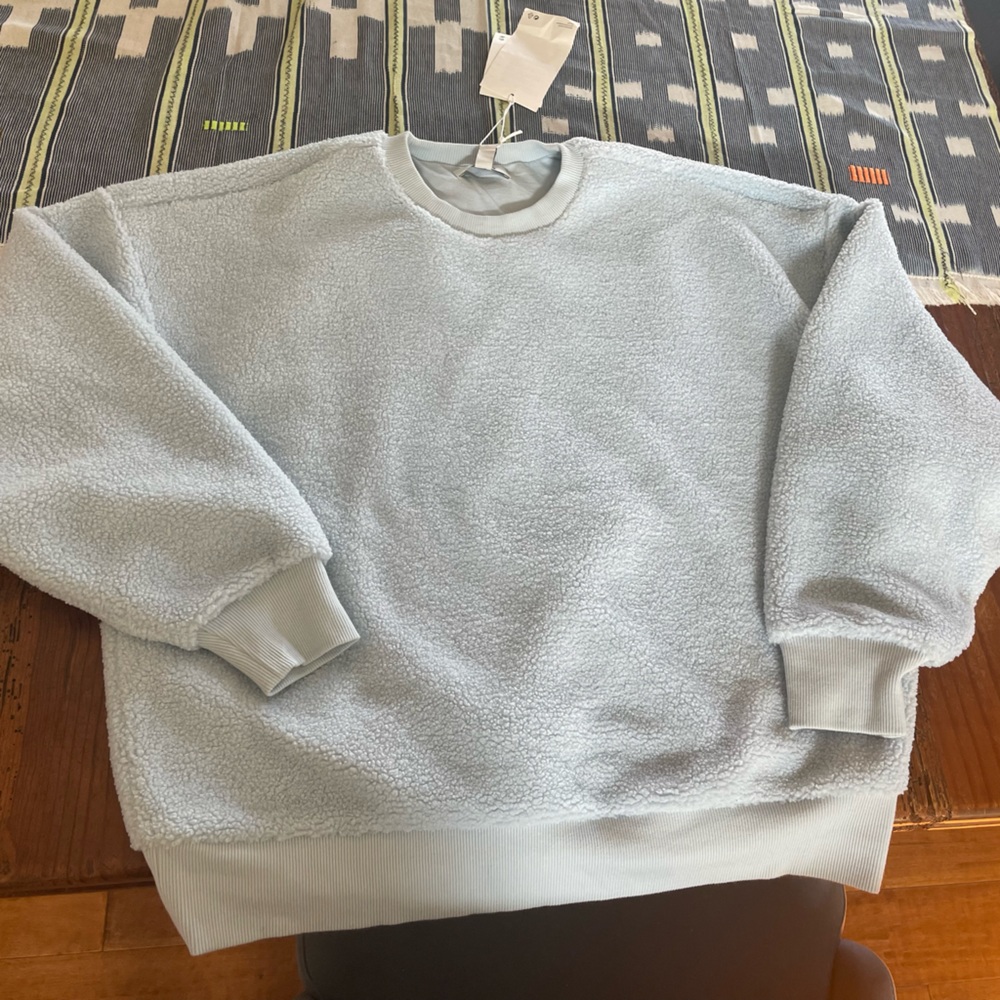 Oversized baby blue COS sweatshirt